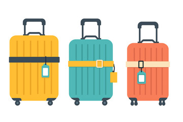 Set of three colorful rolling suitcases with handles and identification tags