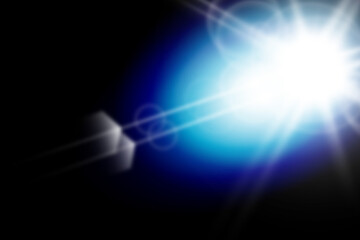 Blue light flare with bright lens reflection effect isolated on black background