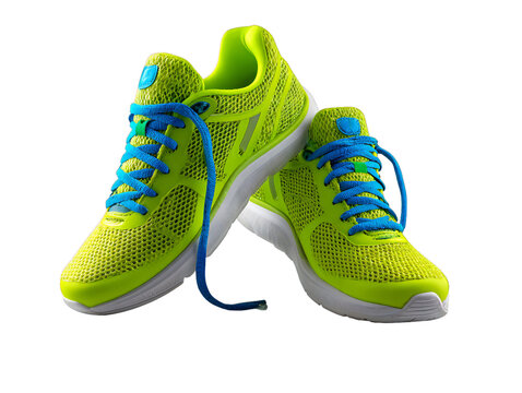 Bright green running sneakers with blue laces isolated on transparent background