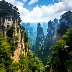 Stunning landscape of towering rock pillars and lush green vegetation beneath a bright blue sky with scattered clouds