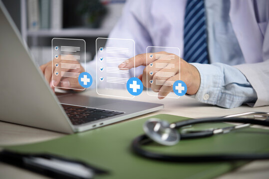 Doctor hands using laptop accessing electronic medical record system digital health checklist document online patient data management healthcare technology workflow hospital compliance.