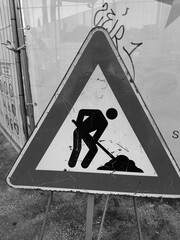 Rome, Italy - October 5, 2025, detail of a road sign: work in progress, on a triangular sign.