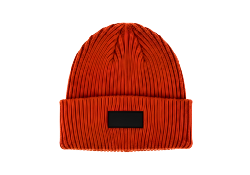 Orange knitted beanie hat with black patch isolated on transparent background