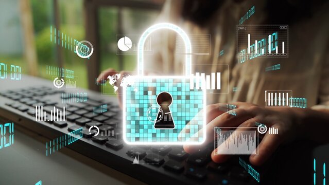 Close-up of a person typing on a keyboard with digital representations of a padlock and data, illustrating the importance of cyber security and protection of personal information online. Xenic
