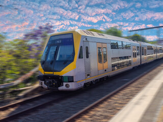 Obraz premium Passenger Train going through Summer Hill train station a suburban Sydney train Station NSW Australia