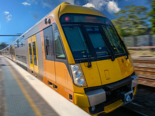 Obraz premium Passenger Train going through Summer Hill train station a suburban Sydney train Station NSW Australia