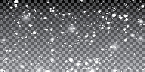 Obraz premium Snow and wind. Vector heavy snowfall, snowflakes in various shapes and forms. Many white cold flakes elements on a transparent background. 