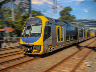 Obraz premium Passenger Train going through Summer Hill train station a suburban Sydney train Station NSW Australia
