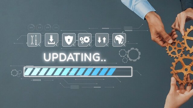 Two hands assemble gears against a digital backdrop with an updating progress bar, representing collaboration and the ongoing evolution in technology. Raster