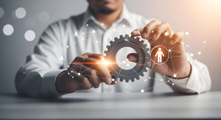 Man Holding Gear with Network Overlay