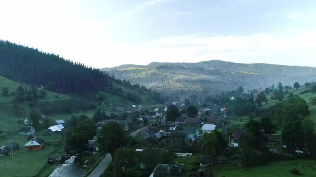 Cozy mountain simple village with blue sky, Cozy simple mountain village under bright blue sky. traditional architecture and peaceful atmosphere ideal for rustic heritage themes