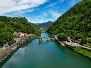 Fototapeta premium Ponte della Maddalena Devil’s Bridge over the Serchio River, Borgo a Mozzano, Tuscany, Italy