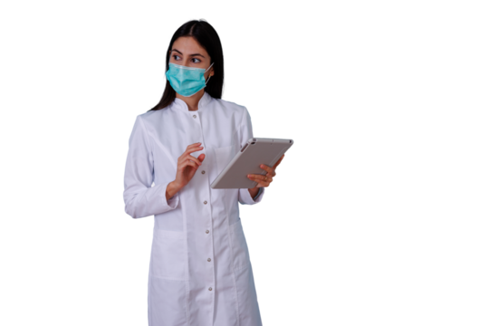 Female doctor wearing surgical mask and lab coat, holding digital tablet, providing medical care and telehealth services on transparent background - Powered by Adobe