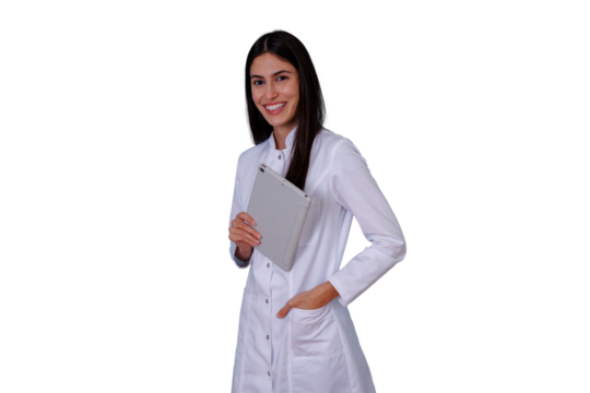 Smiling female doctor holding a digital tablet with hand in pocket, standing confidently, transparent background