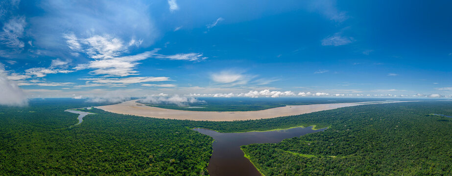 Tarapoto Lake in Amazon river rain forest huge aerial panorama landscape, puerto narino amazonas colombia
