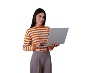 Young woman smiling, standing and using a laptop, working or studying remotely, transparent background