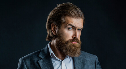 Perfect beard. Bearded man, stylish hairstyle. Portrait of stylish professional hairdresser with beard. Man wearing suit
