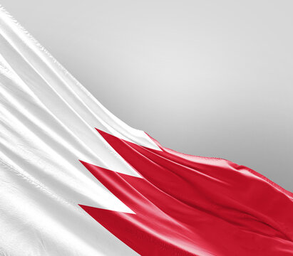 Bahrain flag waving on grey background. Bahrain national flag for independence day.
