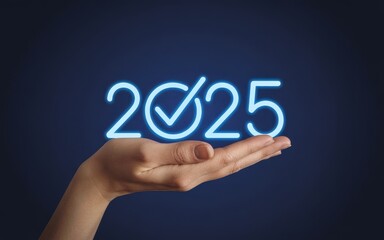 Fototapeta premium Hand holding glowing neon 2025 with checkmark