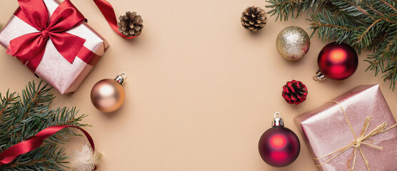 Festive Season Cheer: An arrangement of gifts and ornaments evokes the spirit of the festive season, with wrapped presents, decorative baubles.