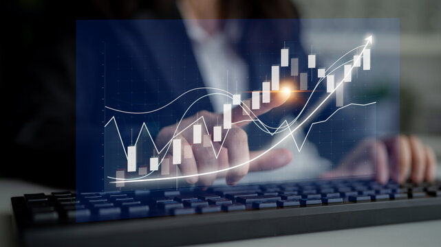 Business professional interacts with an advanced digital interface showcasing financial data and stock market trends while analyzing market insights. Impute