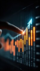 A finger touches a rising arrow on a digital screen, symbolizing growth, success, and upward trends in business and finance