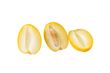 Top view set of fresh ripe yellow date palm fruits in halves isolated with clipping path in png file format. Concept of iftar food in Ramadan for Muslims