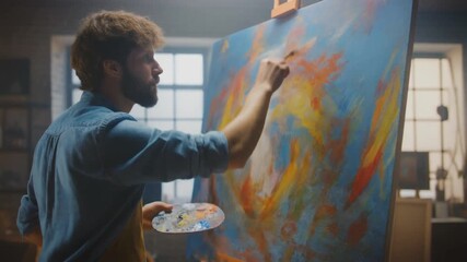 Ultra HD video of young artist painting colorful abstract art in bright studio with creative energy and brush motion details perfect for art branding inspiration and lifestyle visuals
