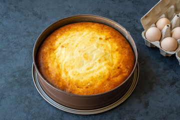 Homemade cheesecake in a baking tin