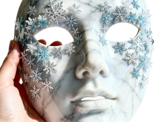 Ornate white mask decorated with delicate snowflakes isolated on transparent background