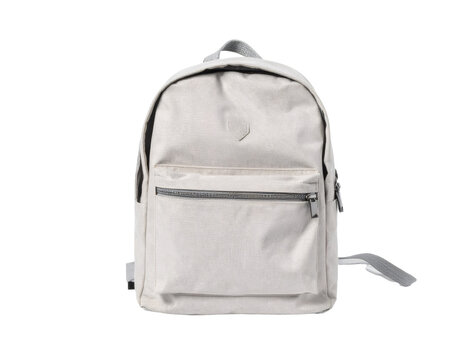 Beige canvas backpack standing on white background, showcasing minimalist design for travel, school, and daily use