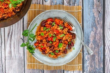 Minced chicken and kidney beans stew in tomato sauce