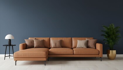 Contemporary living room interior with a tan leather sectional sofa against a dark blue wall, complemented by a side table, lamp, and a potted plant.