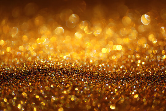 Stunning golden glitter background with bokeh lights creating a magical and festive mood for your next project or design, perfect for luxury brands