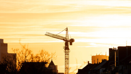 Crane in the Sunset of Duesseldorf Germany in November 2025 - City Developement. High quality photo