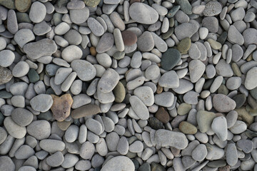 Smooth, Rounded Grey And Multicolored Beach Pebbles Create A Tranquil Natural Texture In Towyn, North Wales, Uk.