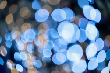 Abstract blue and golden bokeh lights background