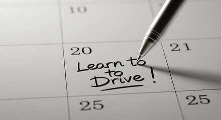 Learn to Drive reminder on calendar with pen marking the day