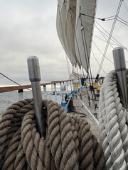 rigging and sails on the bowsprit of a tall ship