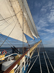 sails on the bowsprit of a tall ship