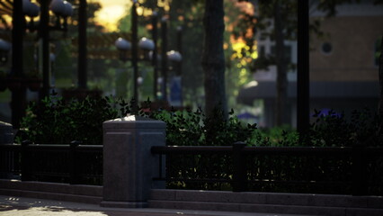 Obraz premium A tranquil urban park path is illuminated by the soft glow of evening light. Lush greenery lines the walkway, creating a peaceful atmosphere for leisurely strolls and relaxation.