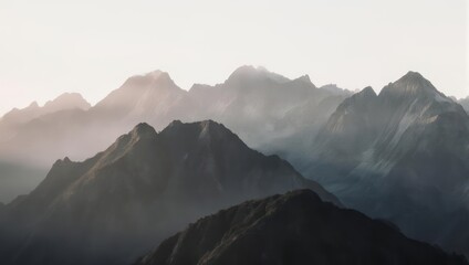 Misty Mountain Range - A Serene Landscape of Peaks and Shadows.