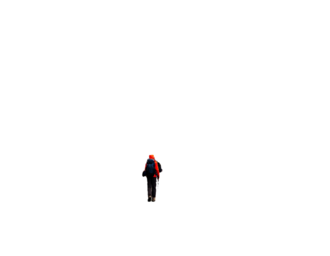 A lone figure with a red backpack stands in vast darkness, dwarfed and seemingly isolated in the unknown
