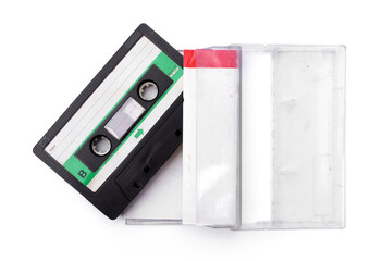 Old transparent compact vintage audio. Cassette tape come out of Clear Audio Case Storage Box isolated on white background.