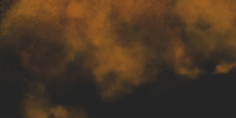 Brown texture. Orange powder explosion on black background. grunge and grainy abstract Flying through stormy brown clouds .