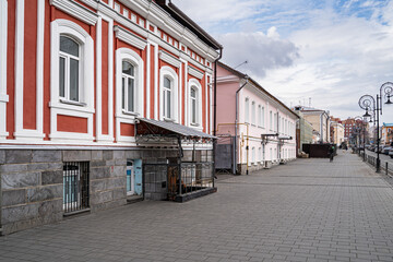 Street with old vintage brick houses in a provincial town, built in 1890 - 1902 in Russia, the city of Ulyanovsk. Former hotels, inns and housing of landowners and rich people