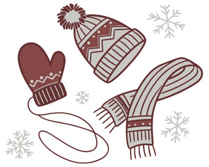 Cozy winter hat mitten and scarf with snowflakes
