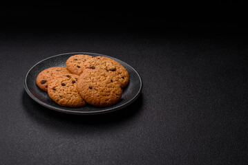 Food, oatmeal chocolate raisin cookies, dessert or breakfast pastry. Oatmeal chocolate cookies