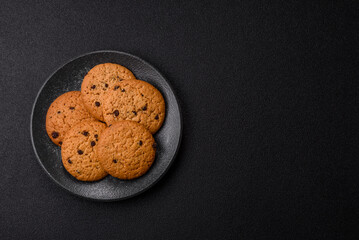 Food, oatmeal chocolate raisin cookies, dessert or breakfast pastry. Oatmeal chocolate cookies