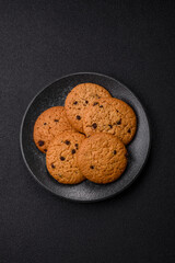 Food, oatmeal chocolate raisin cookies, dessert or breakfast pastry. Oatmeal chocolate cookies